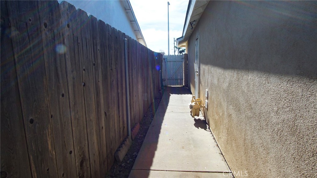 911 East Evergreen Avenue Santa Maria, CA 93454 - Photo 44 of 48 a backyard of a house with wooden fence