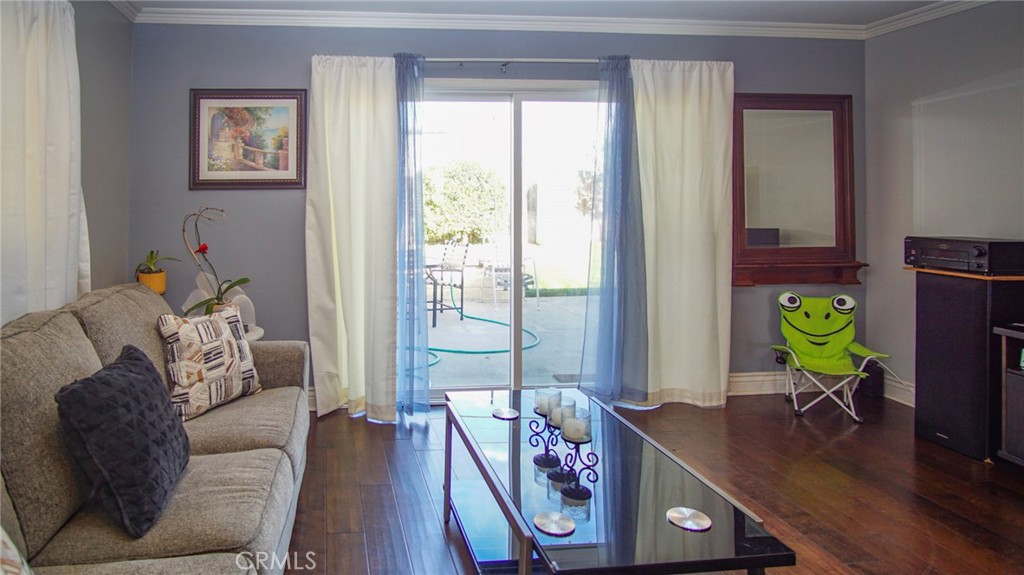911 East Evergreen Avenue Santa Maria, CA 93454 - Photo 10 of 48 a living room with furniture and a window