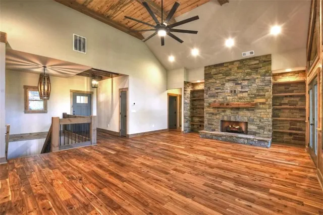 a stove top oven sitting inside of a kitchen