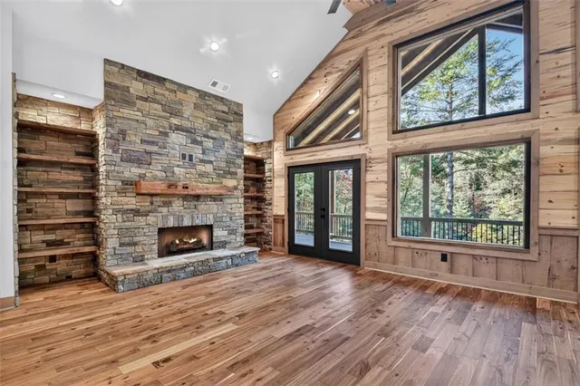a kitchen with a stove sink and cabinets