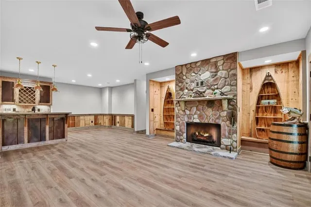 a view of a porch with wooden floor