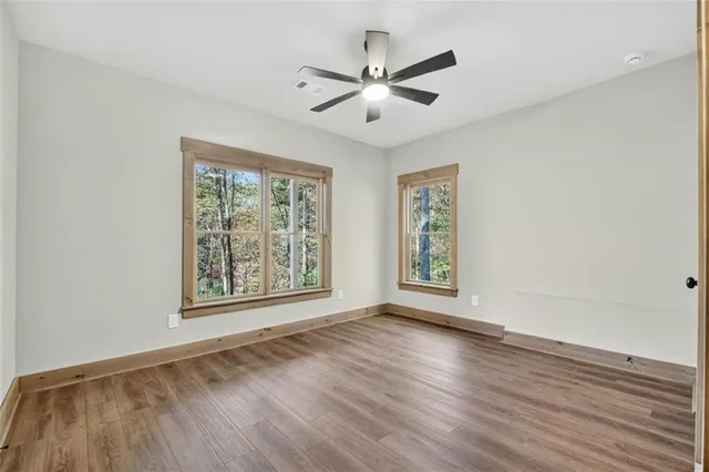 a view of a house with yard and hallway