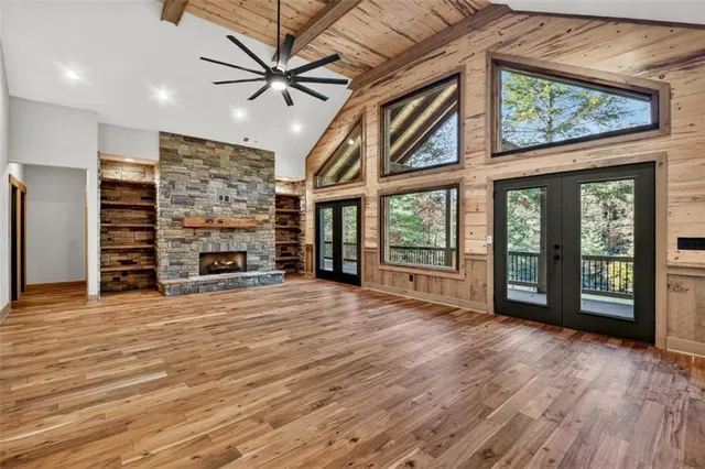 a view of balcony with wooden floor