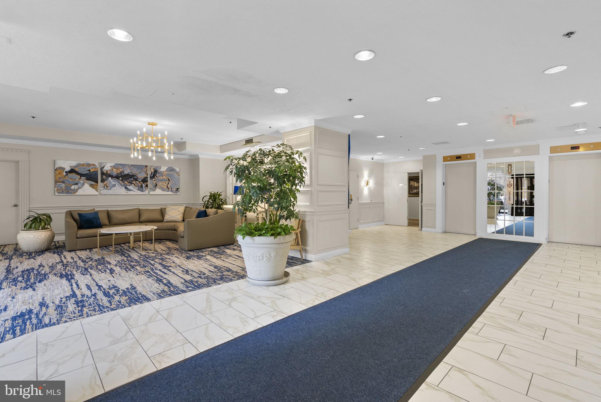 15101 Interlachen Drive, Unit 1705 Silver Spring, MD 20906 - Photo 12 of 17 a view of a living room and kitchen