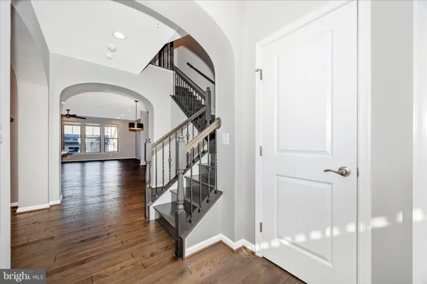 a view of entryway with wooden floor