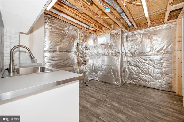 a view of a house with a snow in the yard