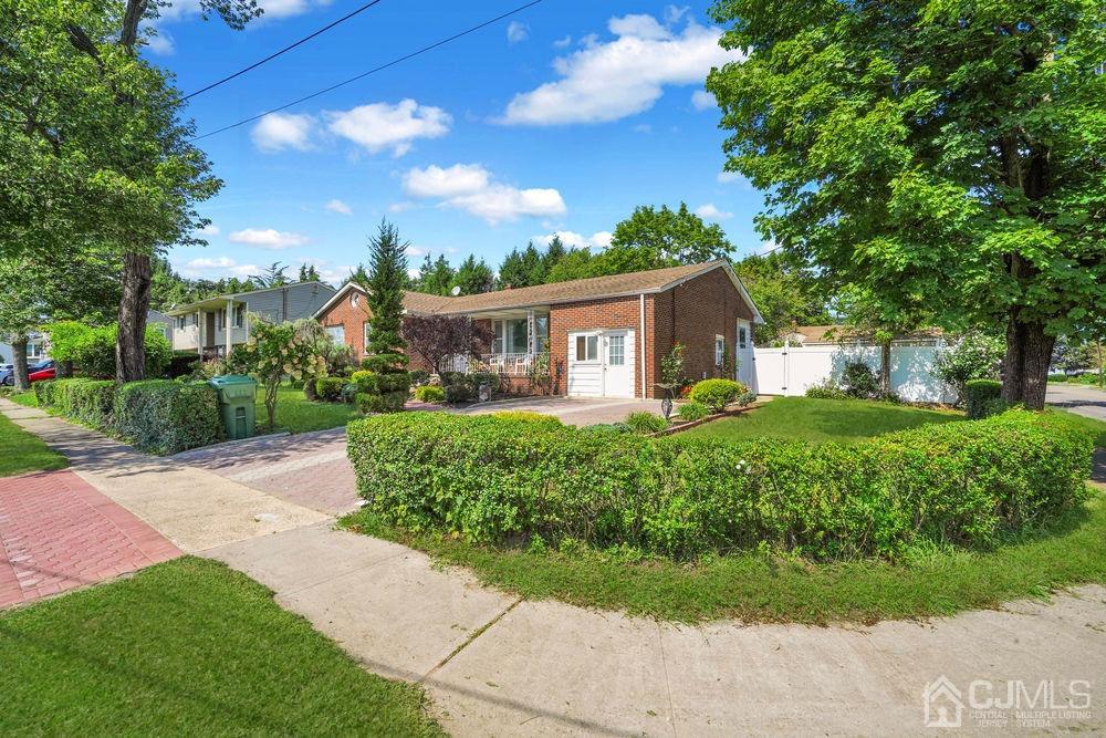 1 Sulliman Road Edison, NJ 08817 - Photo 2 of 24 a front view of house with yard and green space