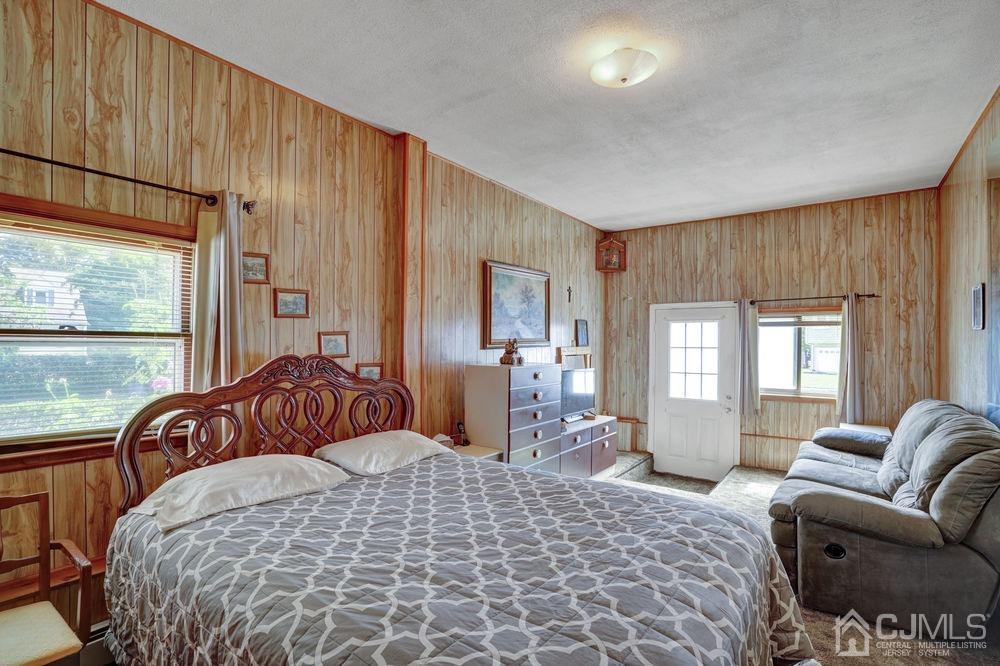1 Sulliman Road Edison, NJ 08817 - Photo 16 of 24 a bedroom with a large bed and a large window