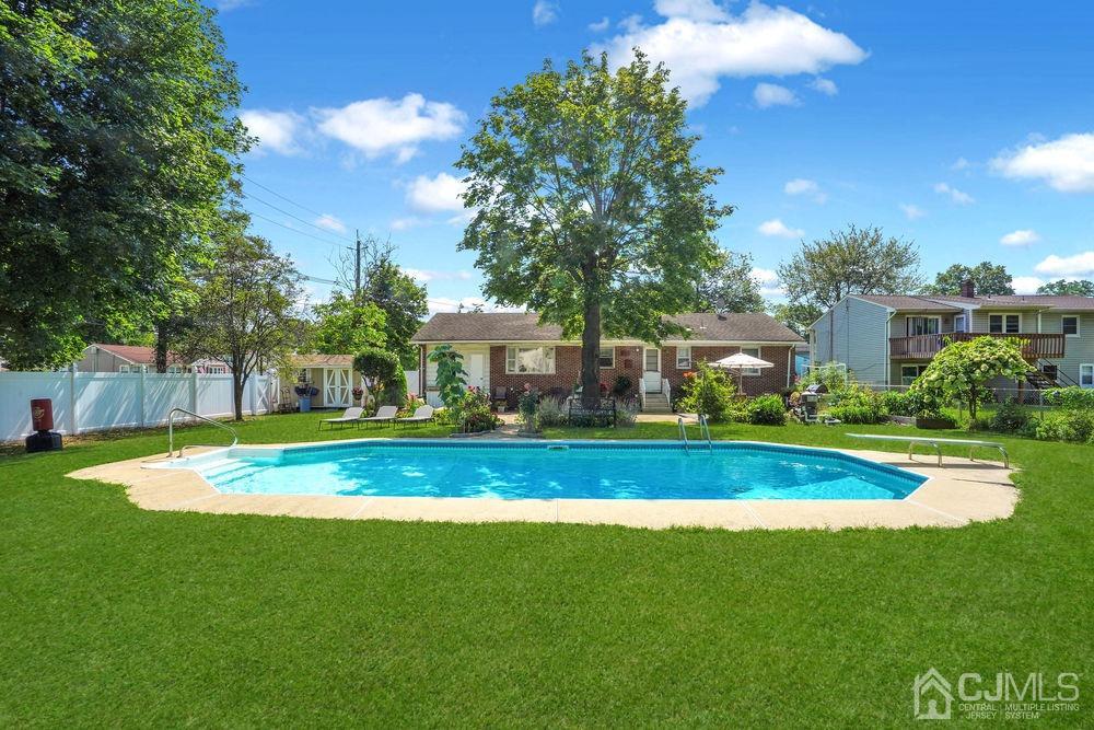 1 Sulliman Road Edison, NJ 08817 - Photo 19 of 24 a view of a house with a big yard