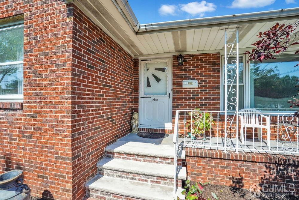 1 Sulliman Road Edison, NJ 08817 - Photo 3 of 24 a view of a door and a window
