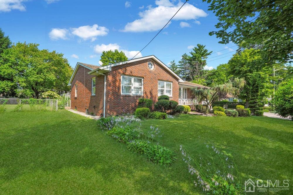 1 Sulliman Road Edison, NJ 08817 - Photo 24 of 24 a front view of a house with a garden