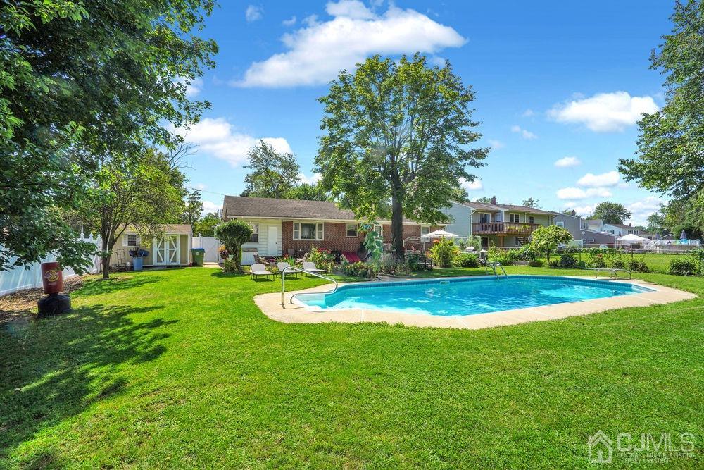 1 Sulliman Road Edison, NJ 08817 - Photo 4 of 24 a view of a house with a big yard