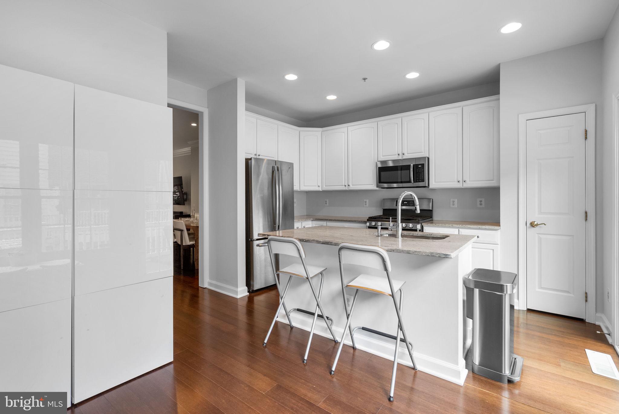8521 Cameron Street Silver Spring, MD 20910 - Photo 11 of 45 Renovated Kitchen with Stainless Steel Appliances