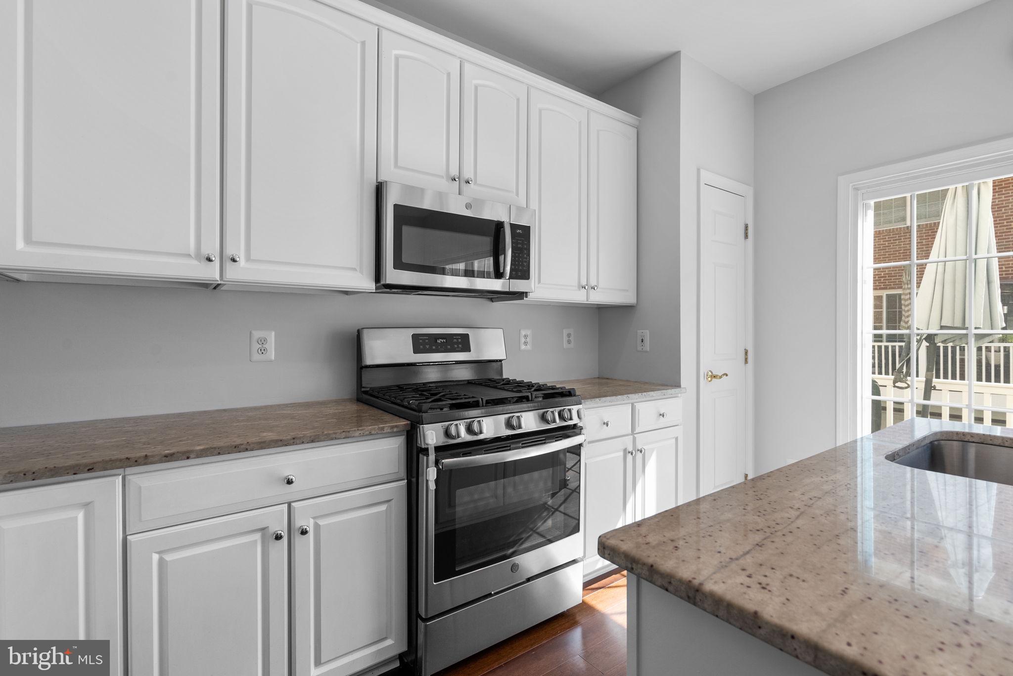 8521 Cameron Street Silver Spring, MD 20910 - Photo 12 of 45 Renovated Kitchen with Granite Countertops