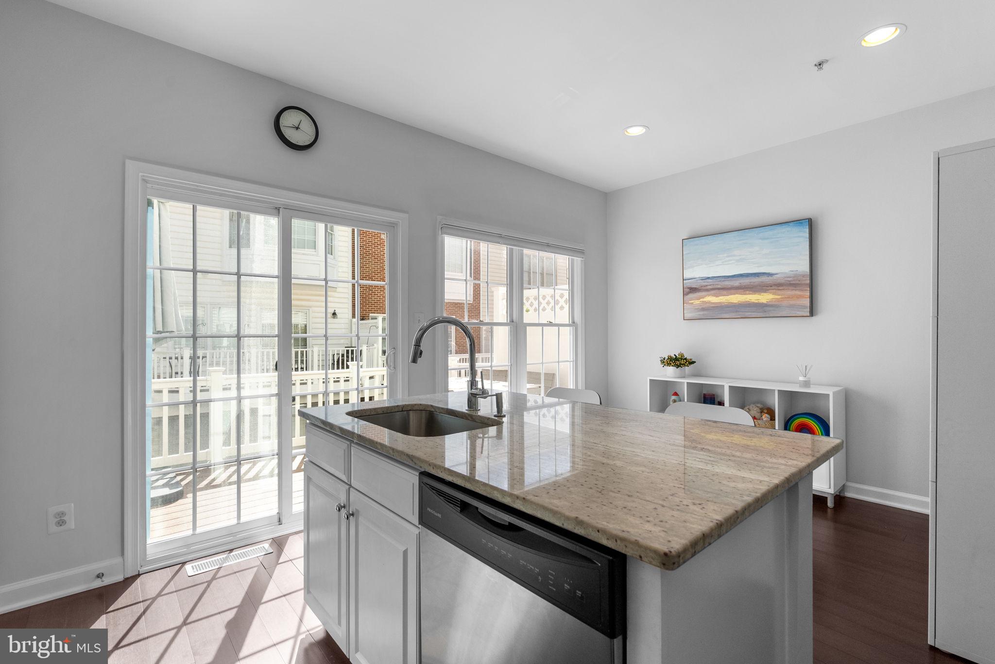 8521 Cameron Street Silver Spring, MD 20910 - Photo 14 of 45 Kitchen with access to Balcony with Trex Deck