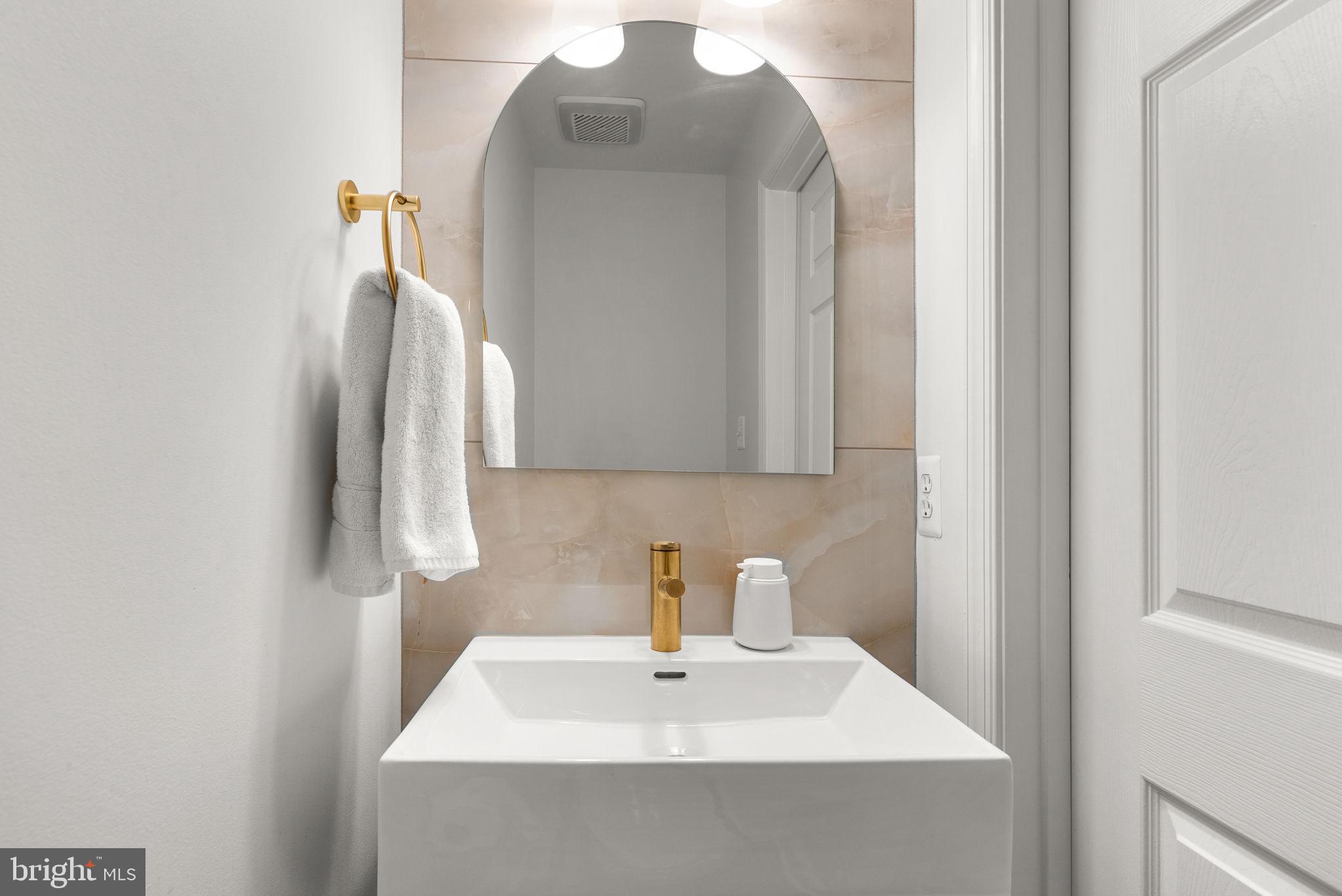 8521 Cameron Street Silver Spring, MD 20910 - Photo 16 of 45 Main Level Renovated Powder Room