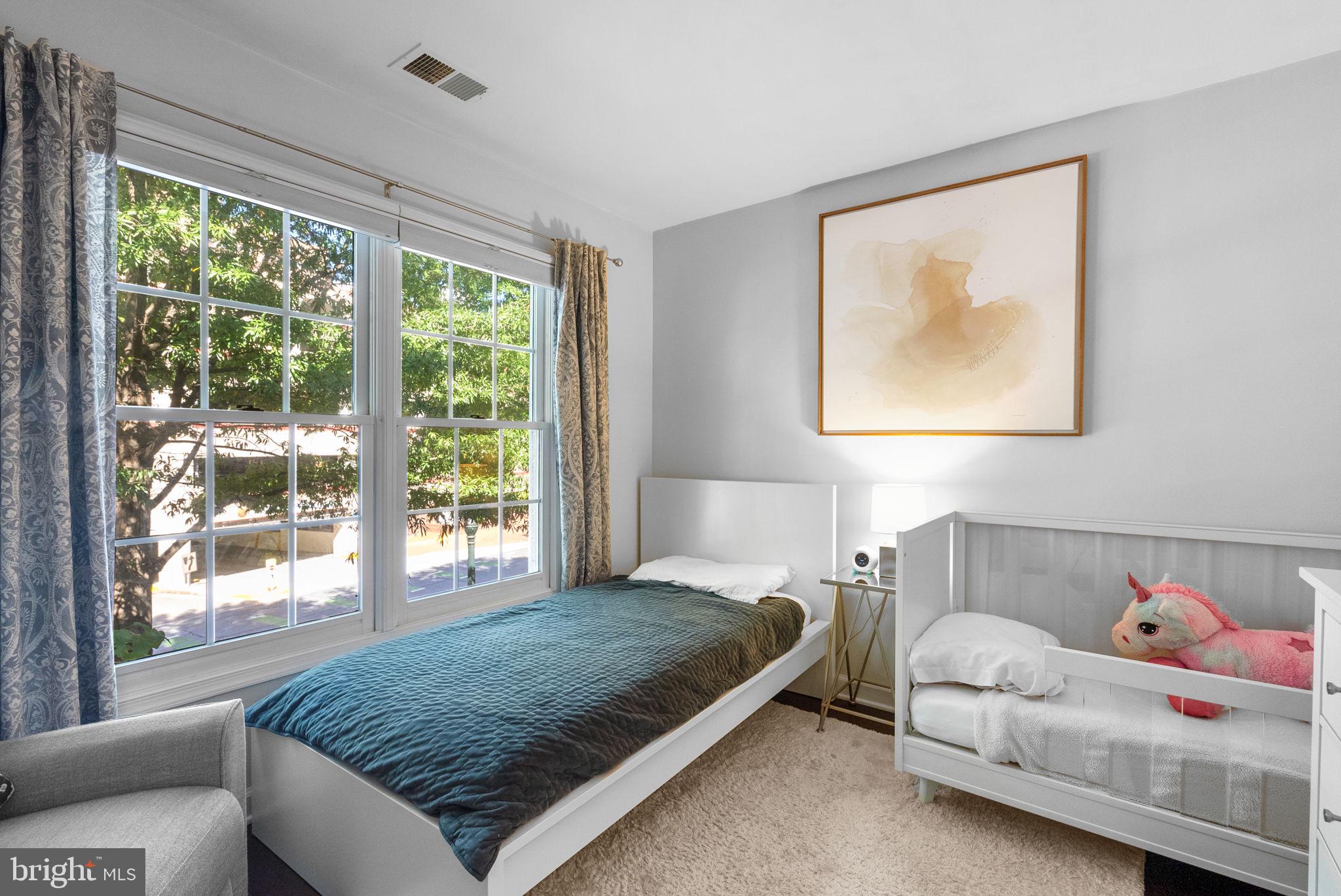 8521 Cameron Street Silver Spring, MD 20910 - Photo 24 of 45 Upper Level (1) 2nd Bedroom with Bamboo Floors