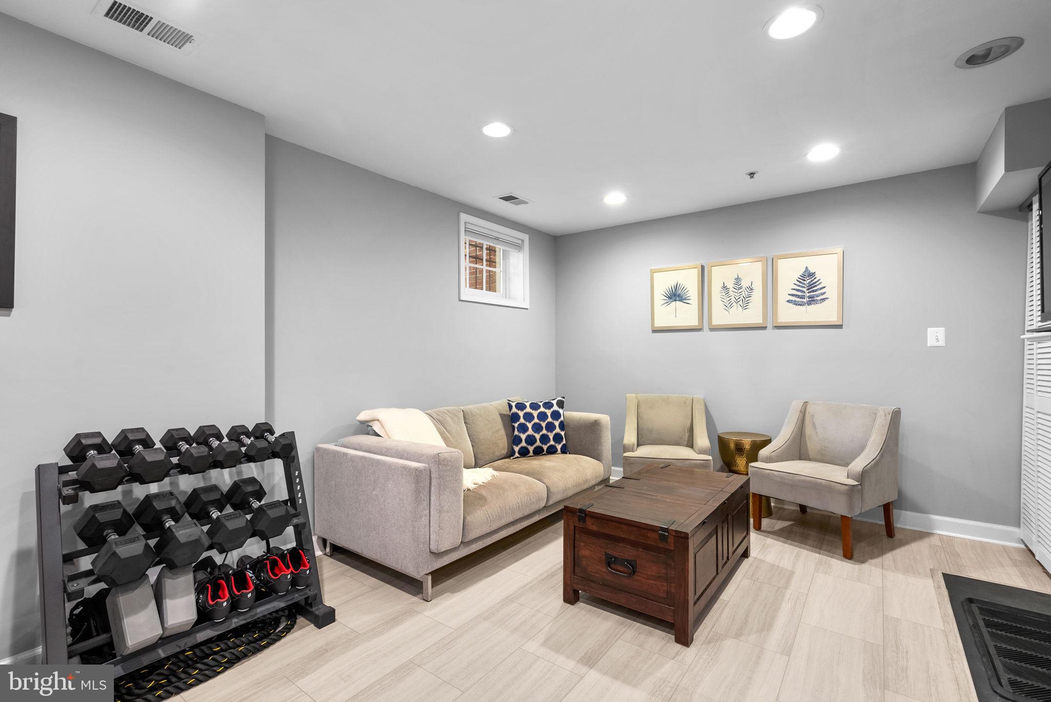 8521 Cameron Street Silver Spring, MD 20910 - Photo 31 of 45 Lower Level Family Room with Tile Floors