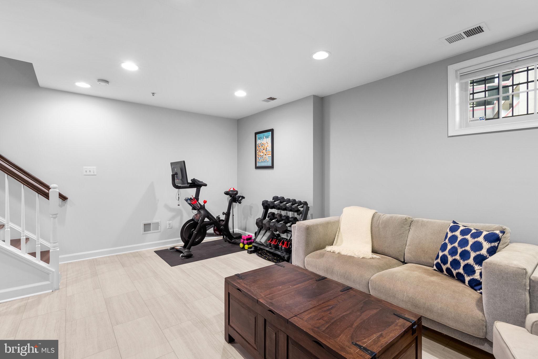8521 Cameron Street Silver Spring, MD 20910 - Photo 32 of 45 Lower Level Family Room with Tile Floors