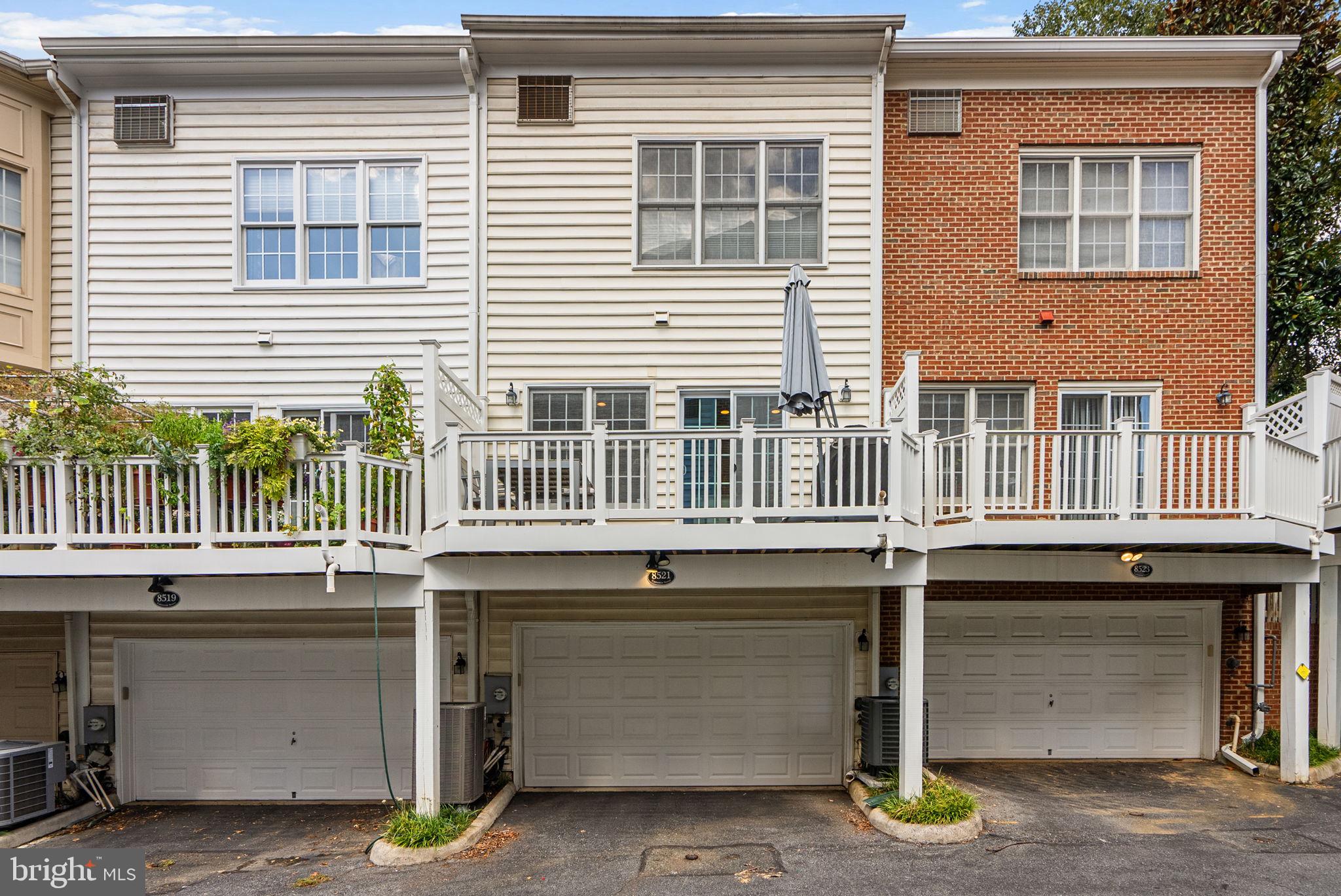 8521 Cameron Street Silver Spring, MD 20910 - Photo 39 of 45 Rear of Home with Balcony and 2-Car Garage