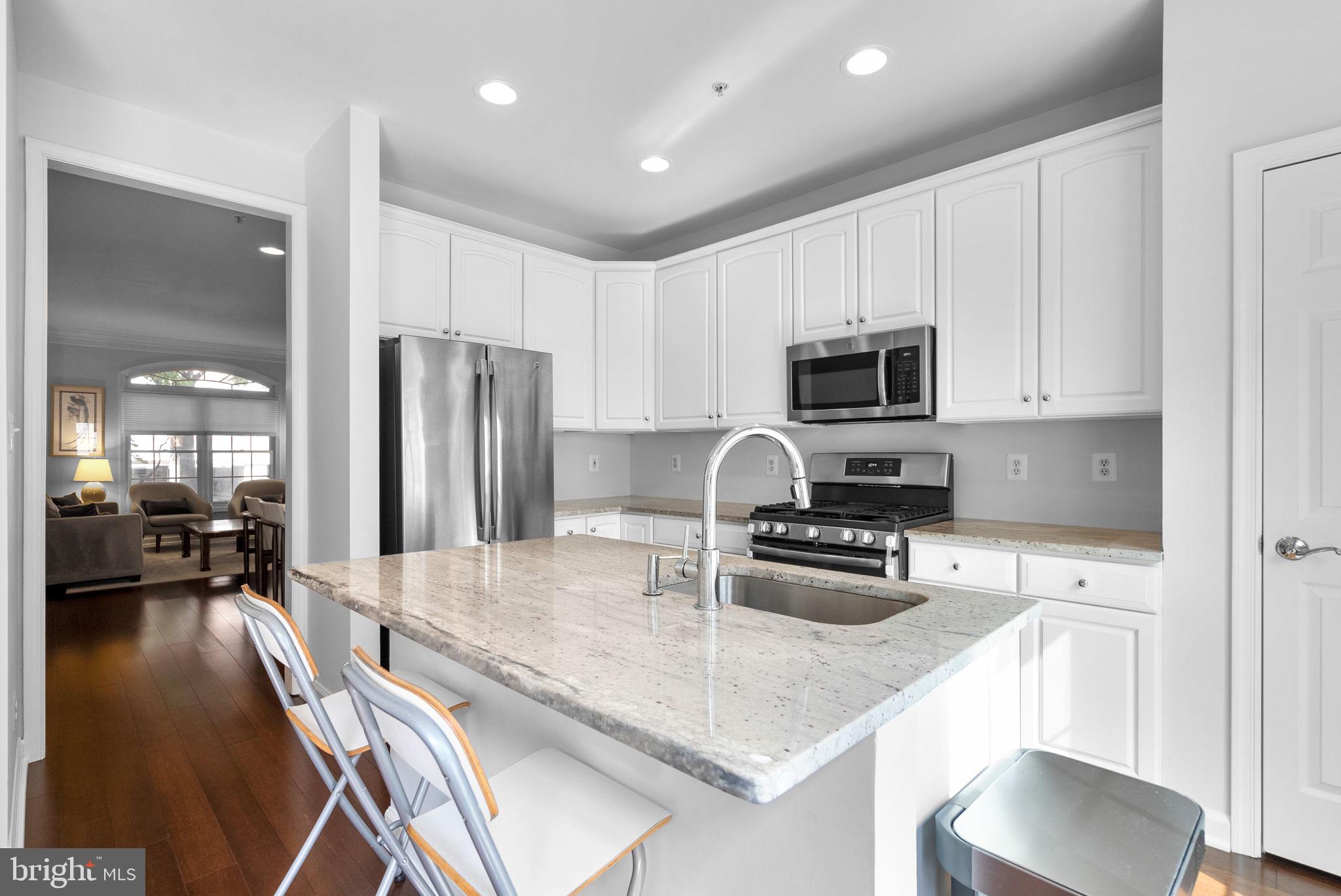 8521 Cameron Street Silver Spring, MD 20910 - Photo 10 of 45 Renovated Kitchen with Center Island
