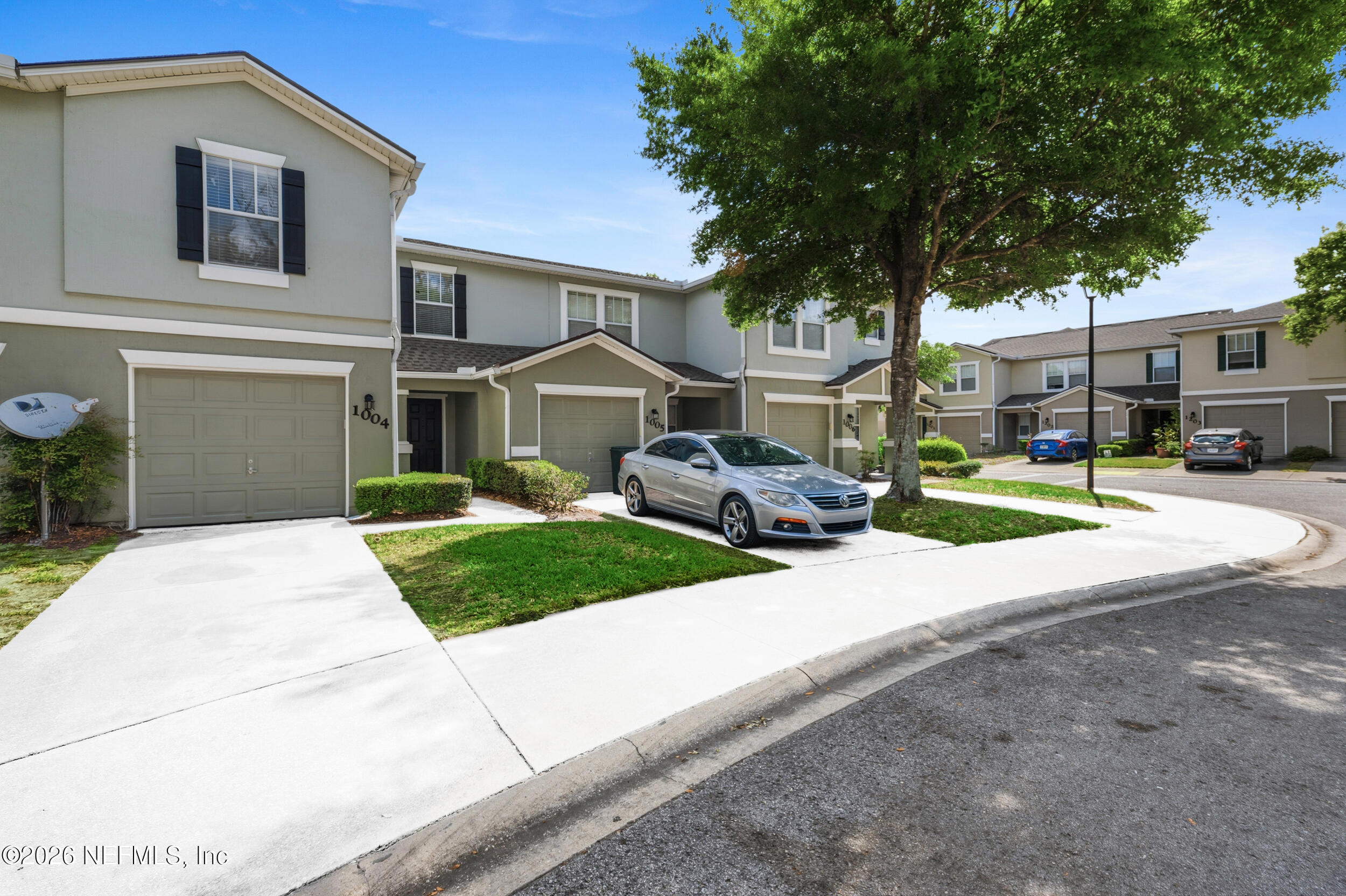 6700 Bowden Road, Unit 1004 Jacksonville, FL 32216 - Photo 1 of 25 a house view with a garden space