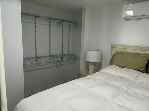 a bathroom with a sink a toilet and vanity