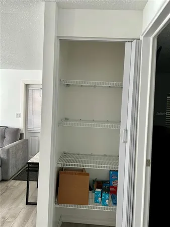 a room with storage and utility