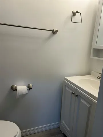 a bathroom with a sink and toilet