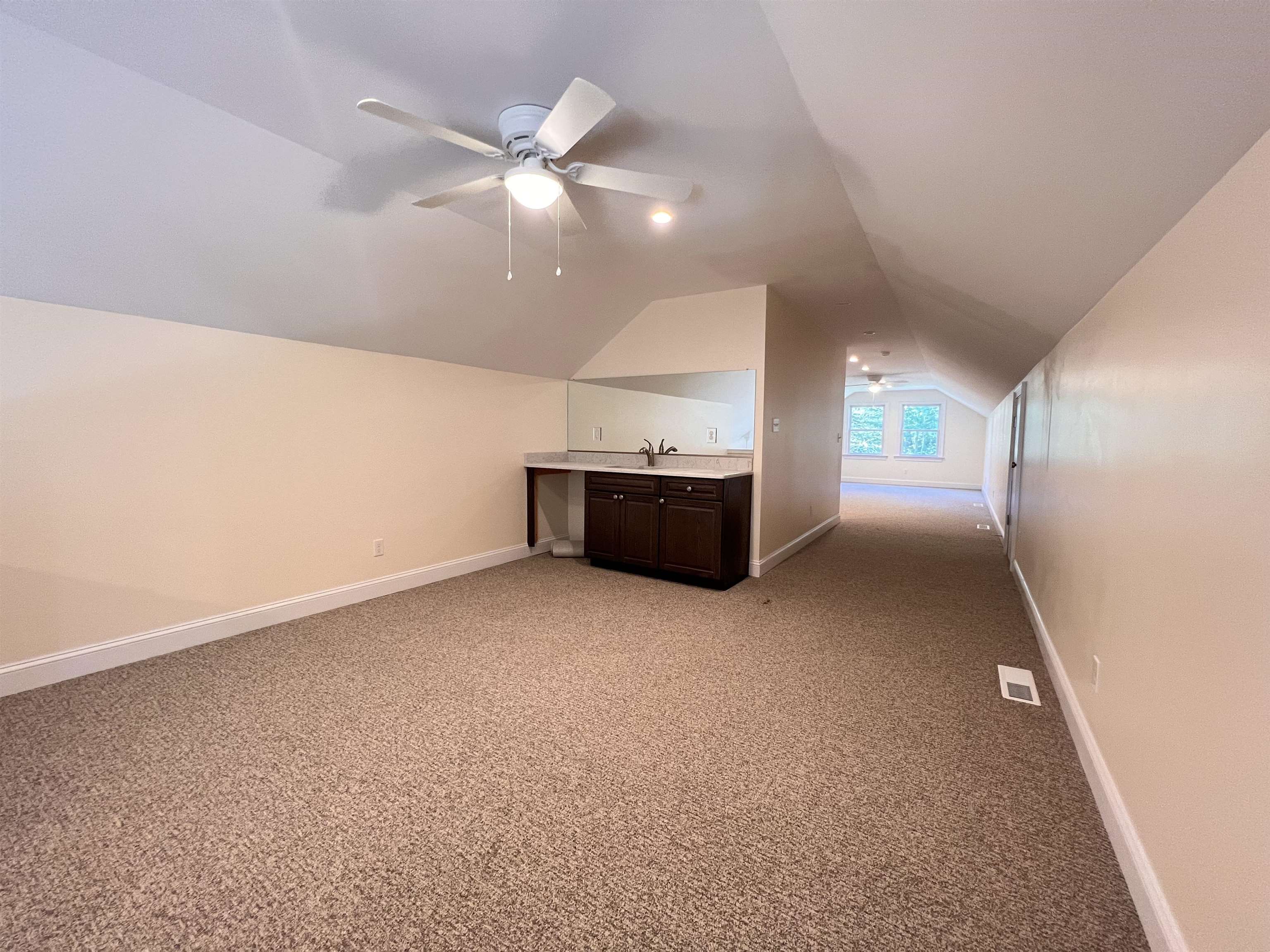 812 Meadowview Road Erma, NJ 08204 - Photo 28 of 48 en empty room with windows and ceiling fan