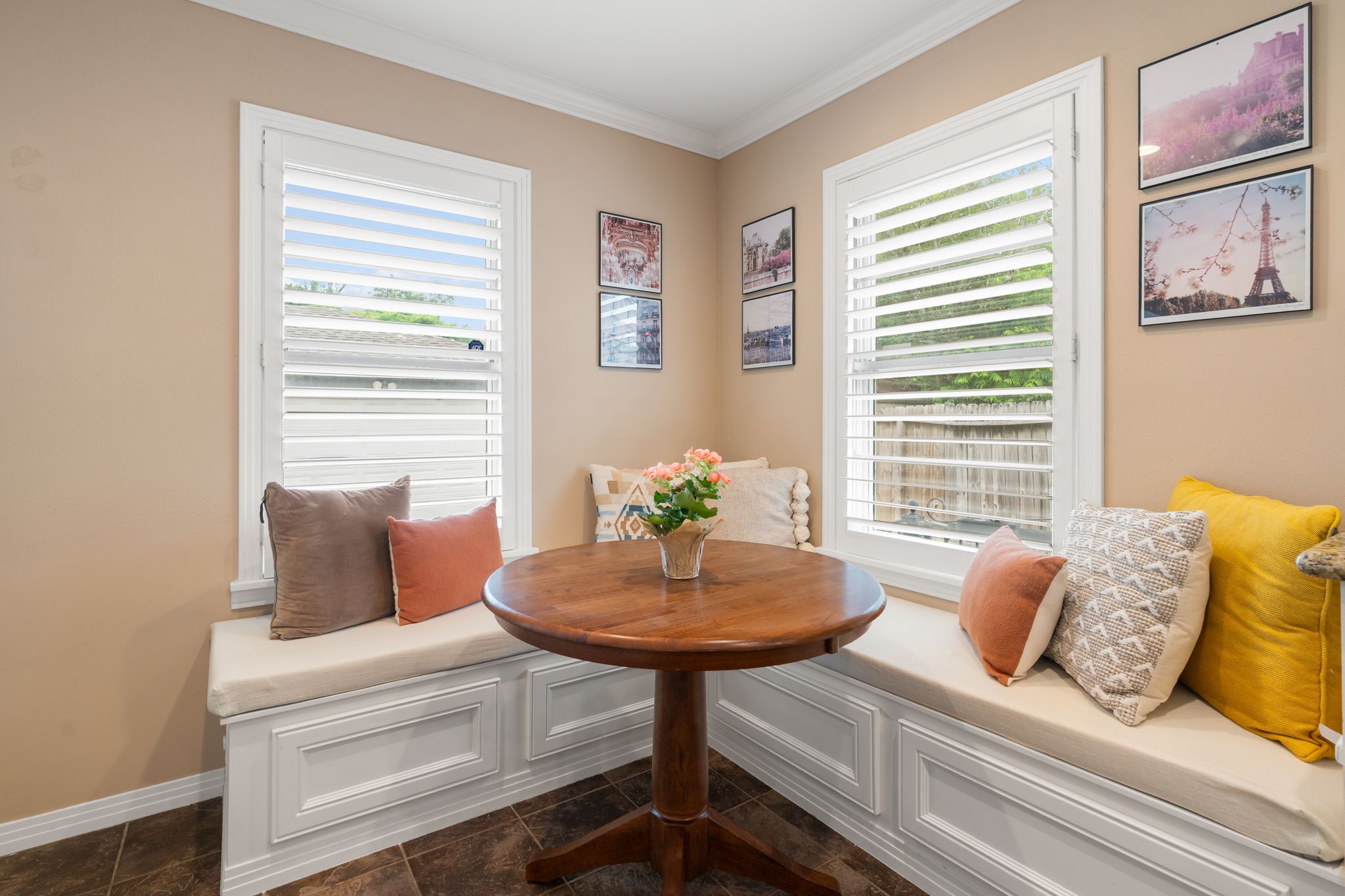 1115 Woodhill Road Houston, TX 77008 - Photo 7 of 29 The cutest custom breakfast area nook in kitchen! Plantation shutters to let in the natural light.