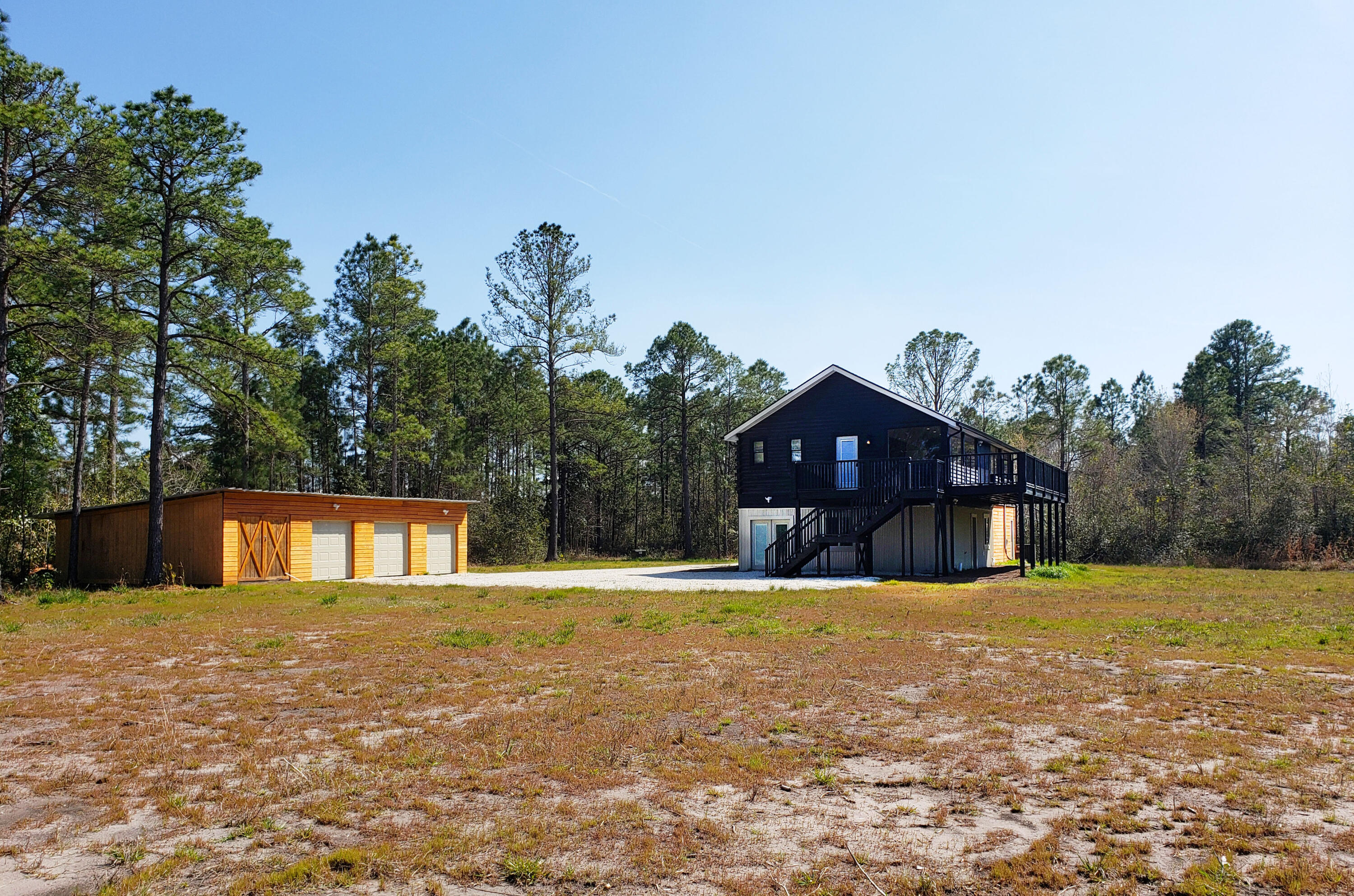 1220 County Rd S-22-31 Georgetown, SC 29440 - Photo 1 of 15 house and garage