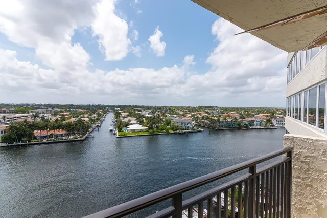 a view of a lake with a outdoor seating
