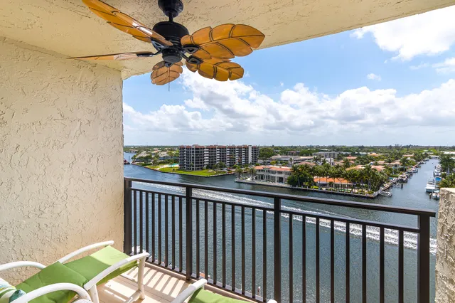 a view of a balcony with furniture