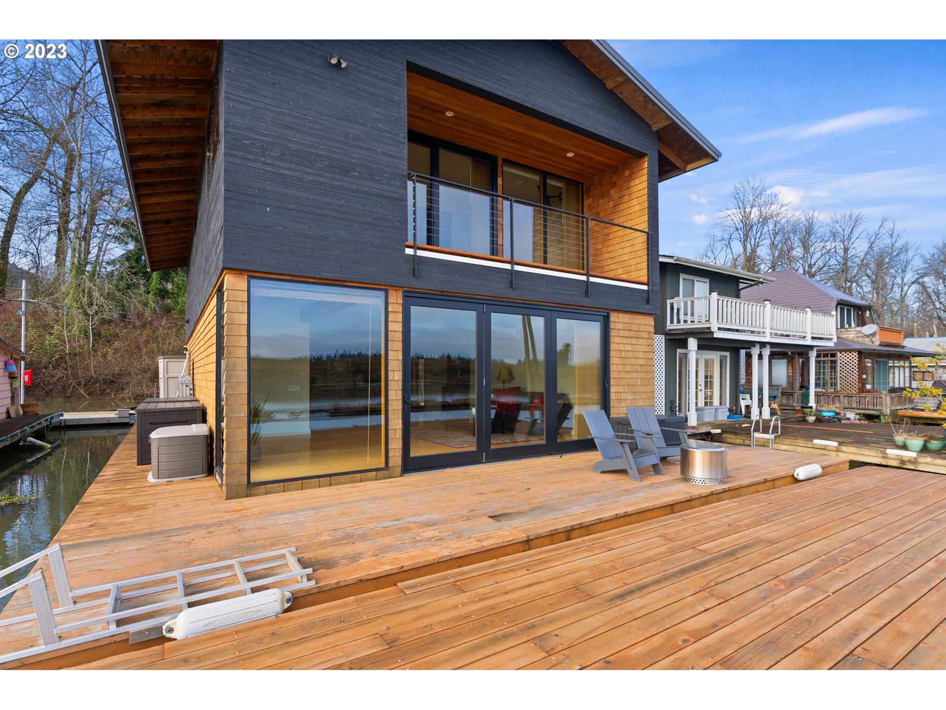 14974 Northwest Mill Road Portland, OR 97231 - Photo 3 of 29 a view of a building with sitting area