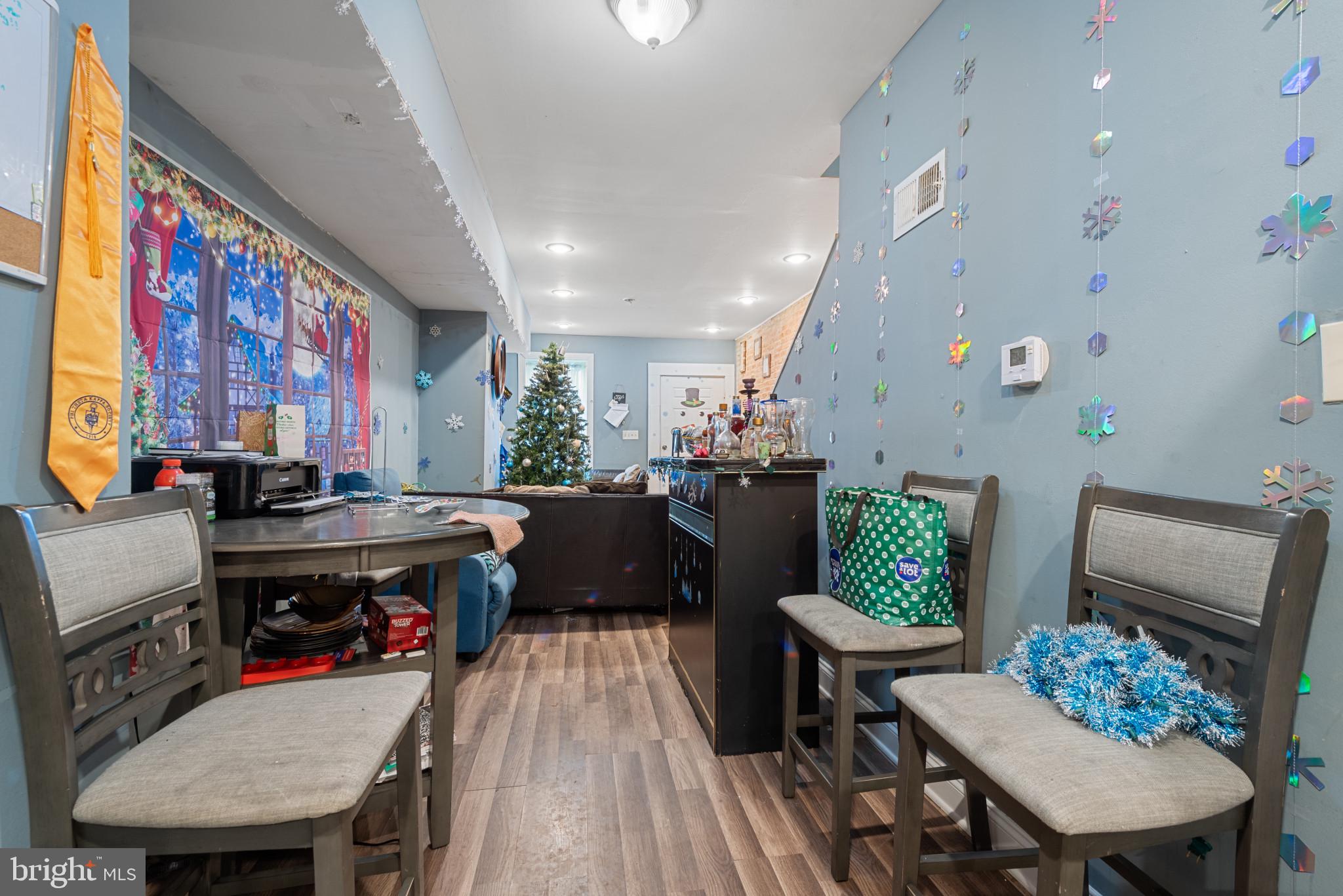 1823 Ramsay Street Baltimore, MD 21223 - Photo 13 of 19 a living room with furniture kitchen view and a table