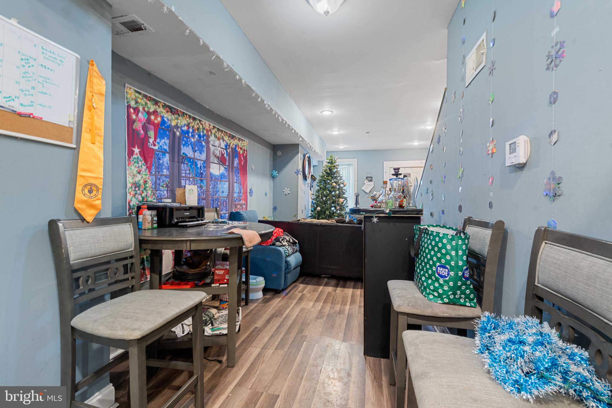 1823 Ramsay Street Baltimore, MD 21223 - Photo 14 of 19 a room with furniture and a potted plant