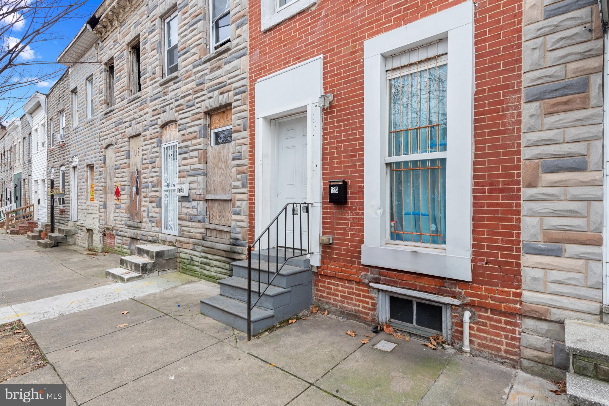 1823 Ramsay Street Baltimore, MD 21223 - Photo 4 of 19 a view of a brick building with many windows