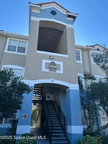 a front view of a house with balcony