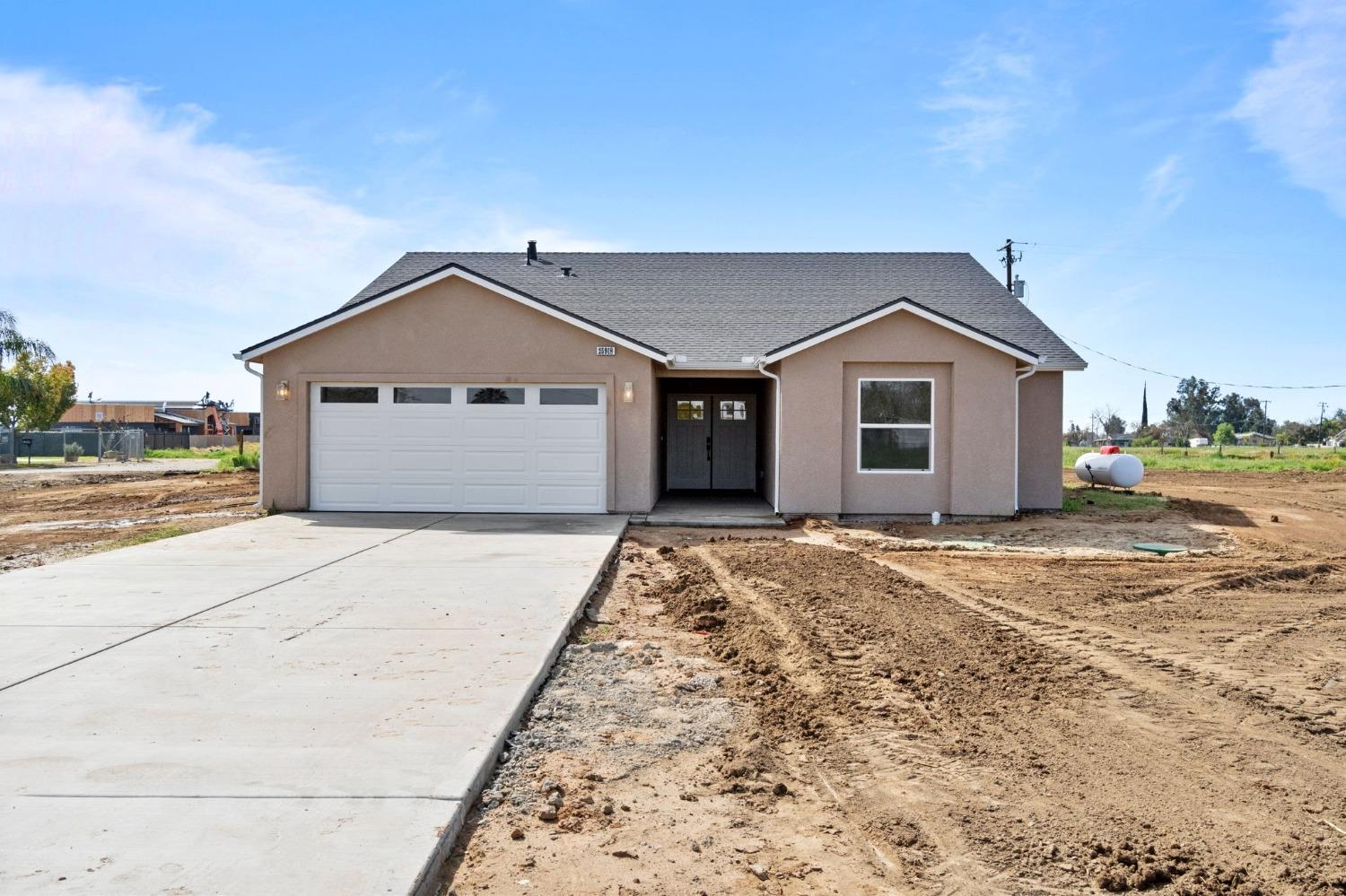 25918 Tanforan Drive Madera, CA 93638 - Photo 1 of 37 a house with a outdoor space