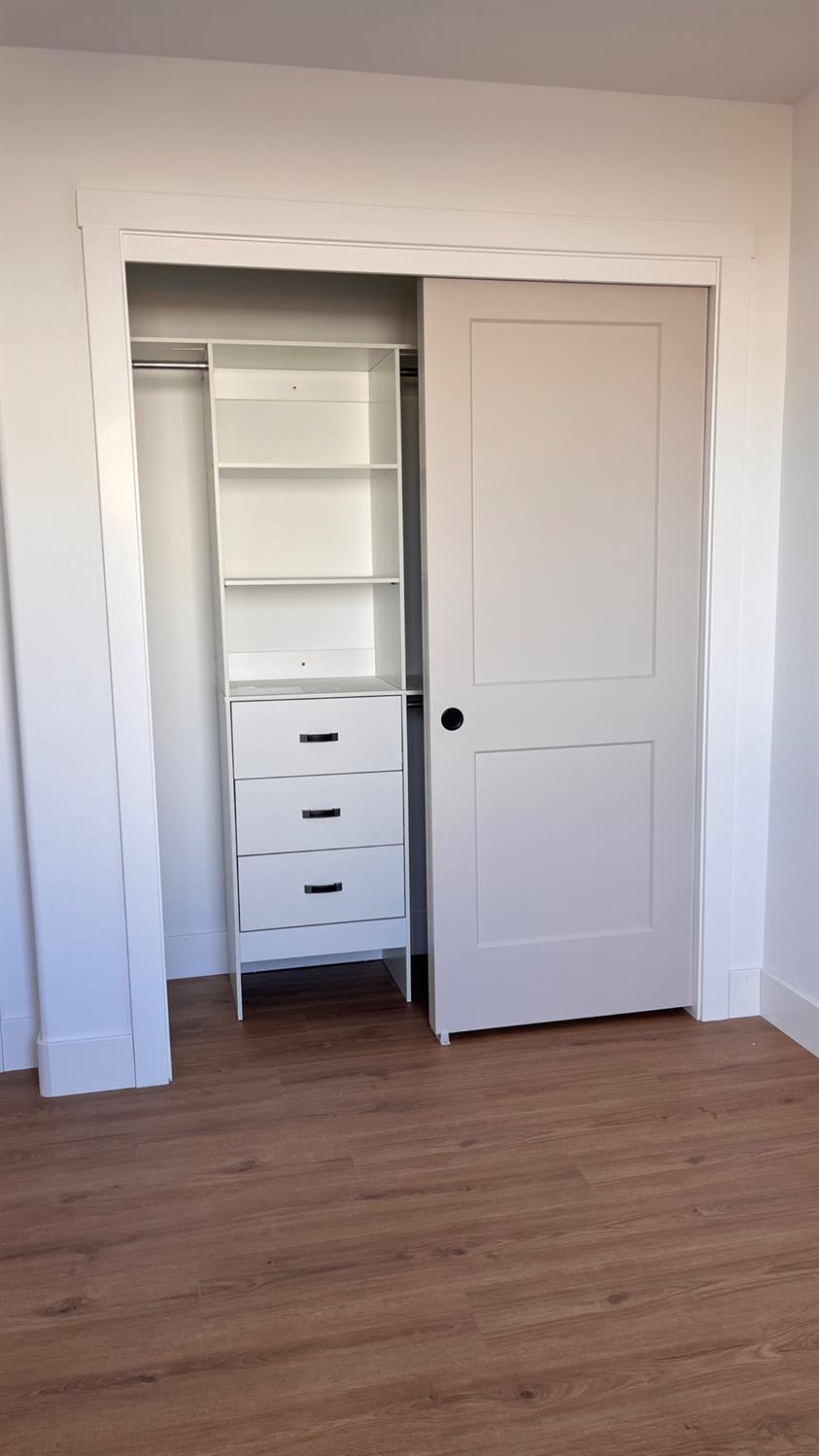 25918 Tanforan Drive Madera, CA 93638 - Photo 27 of 37 a view of walk in closet with empty room