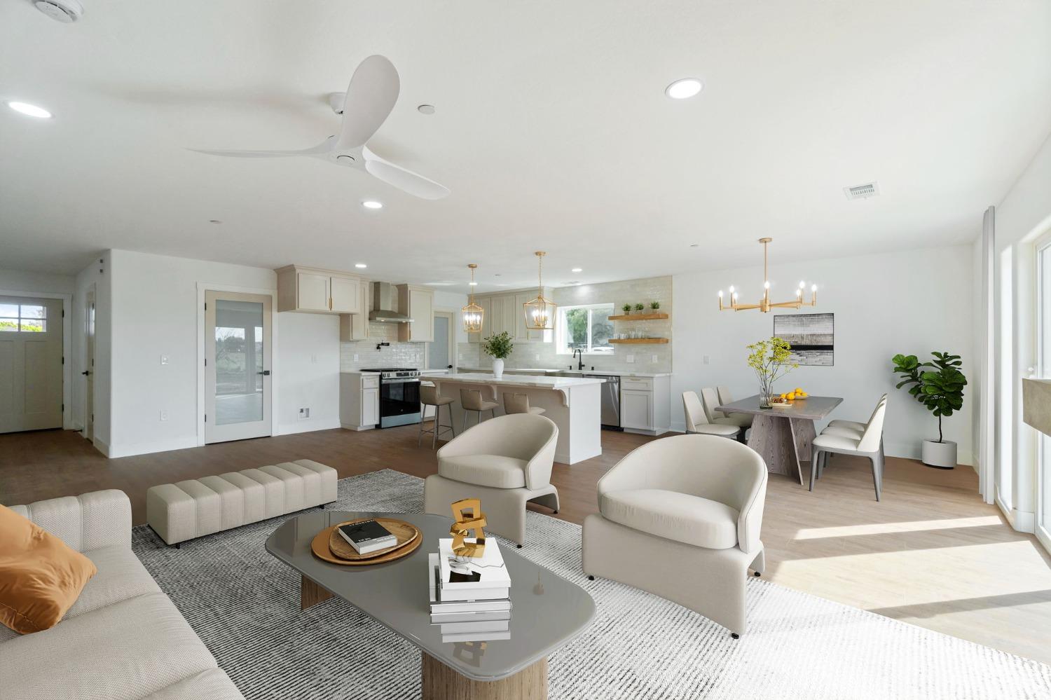 25918 Tanforan Drive Madera, CA 93638 - Photo 10 of 37 a living room with furniture kitchen and a table