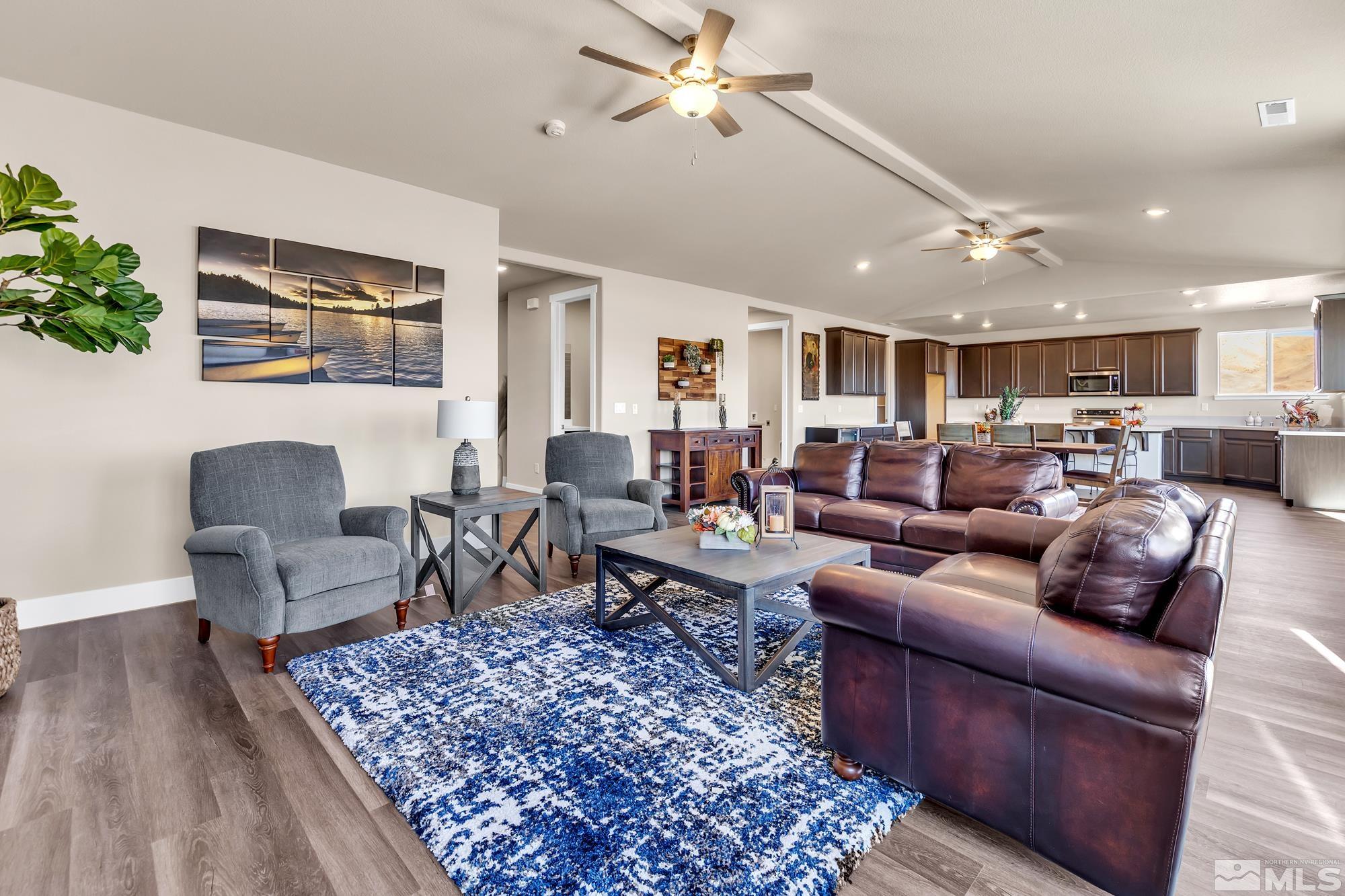250 Paloma Ranch Court Reno, NV 89510 - Photo 20 of 35 a living room with furniture or couch and a dining table