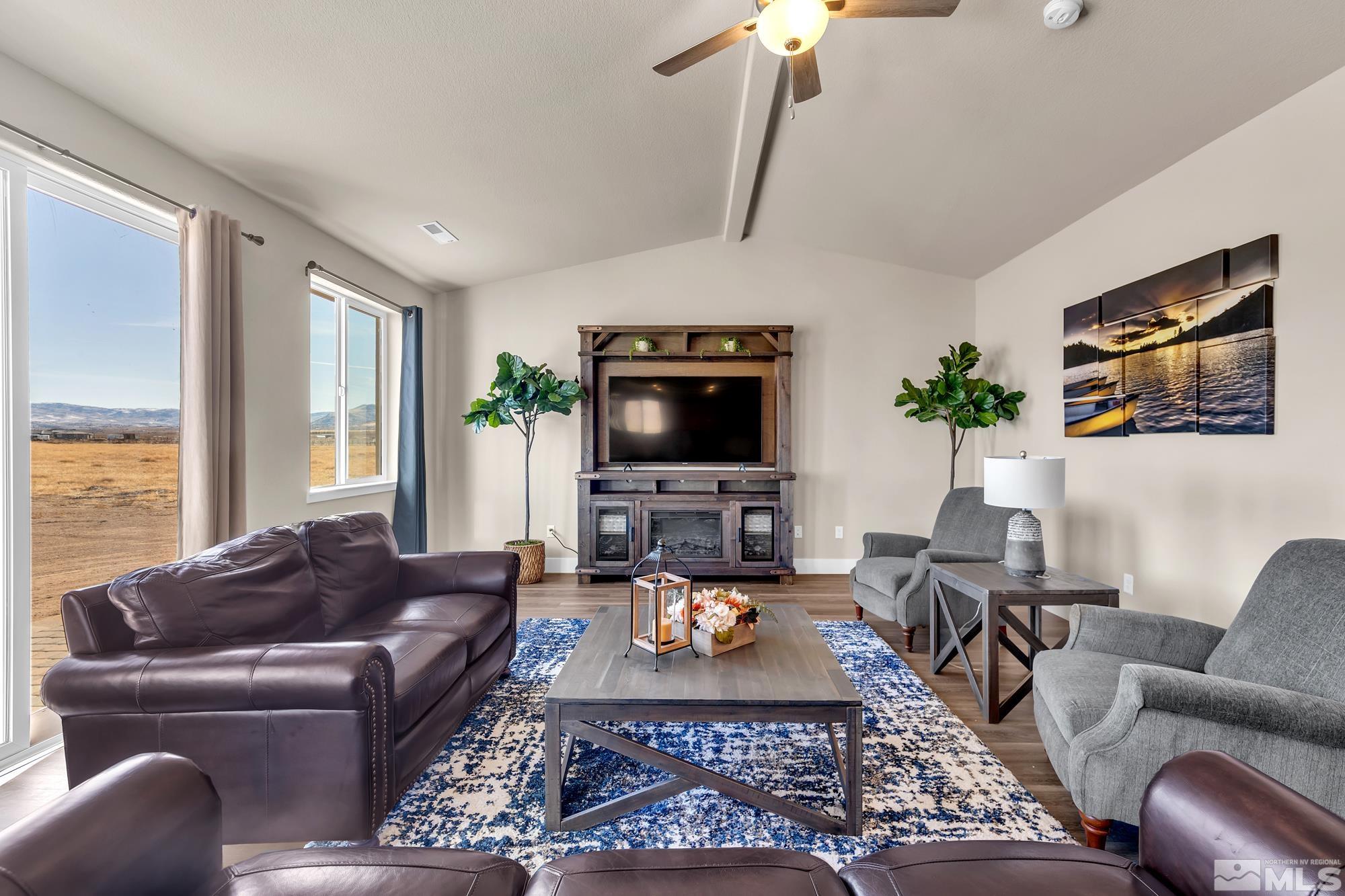 250 Paloma Ranch Court Reno, NV 89510 - Photo 22 of 35 a living room with furniture and a flat screen tv