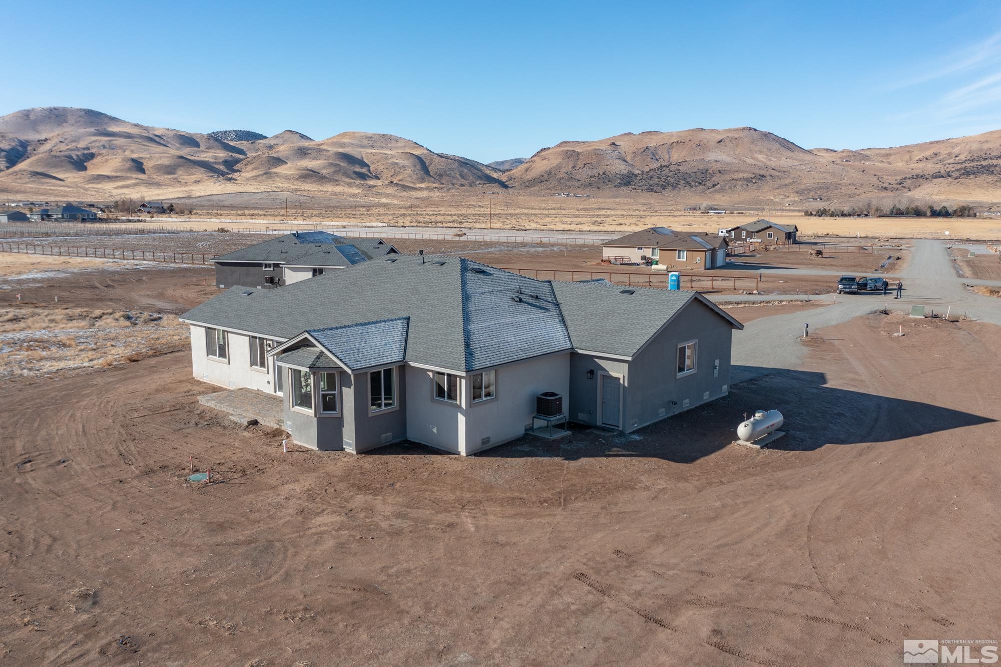250 Paloma Ranch Court Reno, NV 89510 - Photo 34 of 35 a view of a house with a mountain