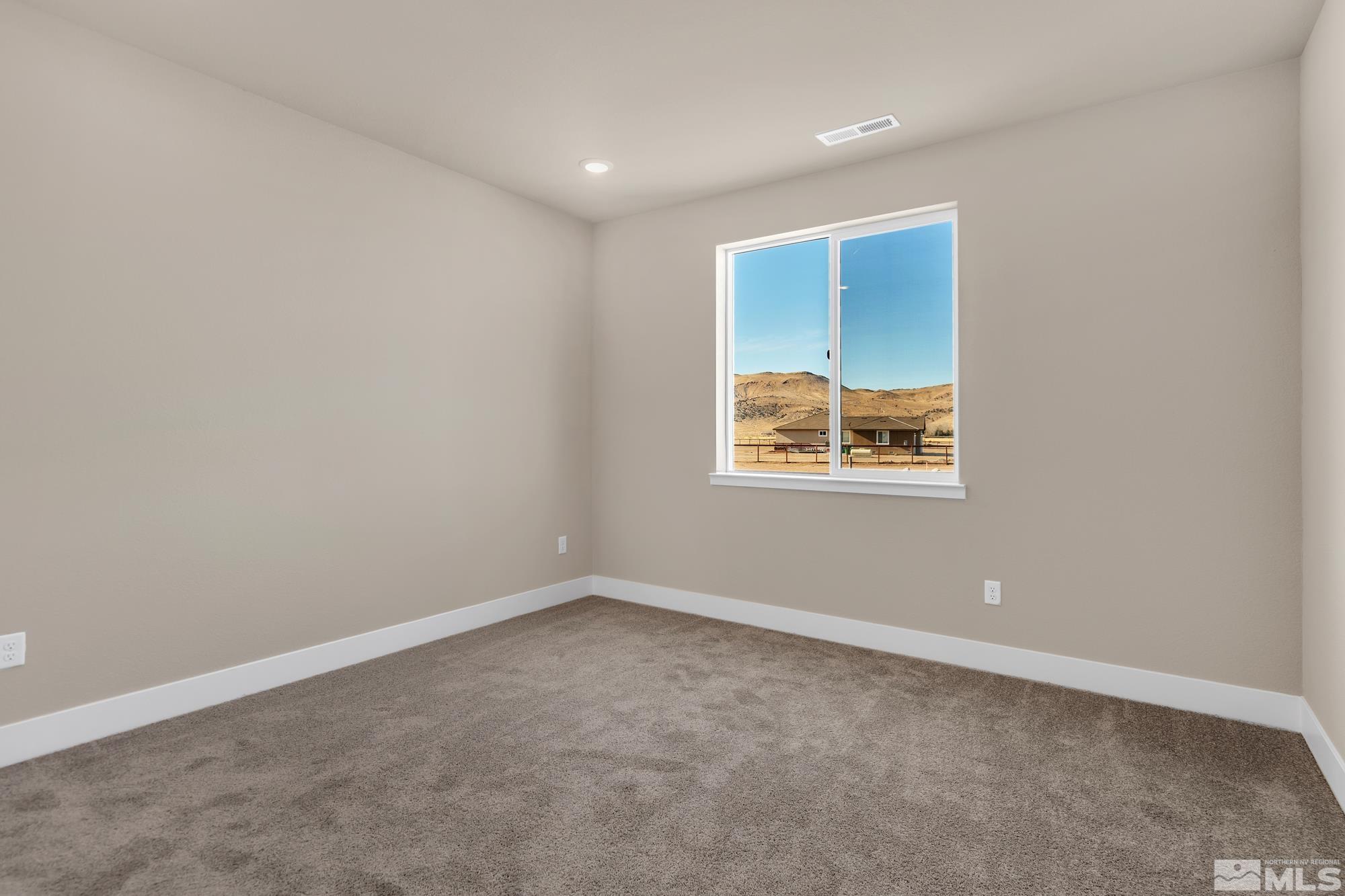 250 Paloma Ranch Court Reno, NV 89510 - Photo 6 of 35 an empty room with windows