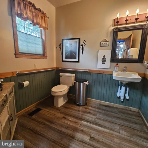 a reading room with furniture and a book shelf