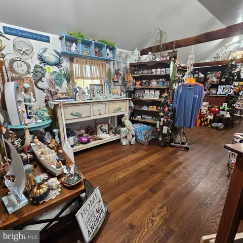 a view of a livingroom with furniture and toys