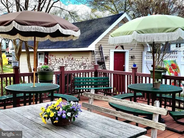 a view of outdoor sitting area with furniture
