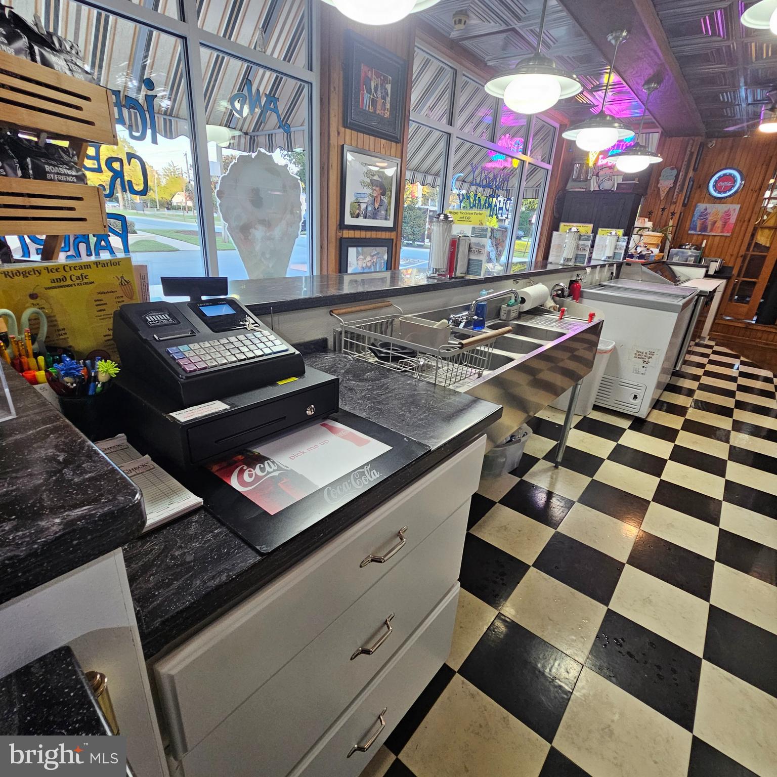 7 West Belle Street Ridgely, MD 21660 - Photo 6 of 18 a open kitchen with stainless steel appliances granite countertop a stove a sink and a microwave